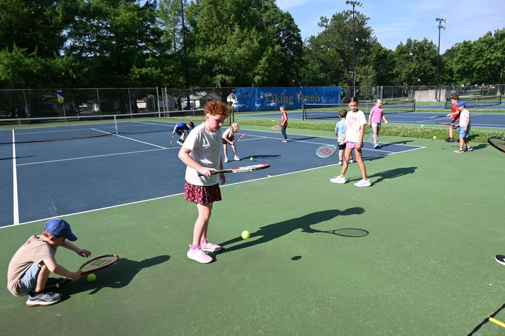 A girl practices controlling the ball.