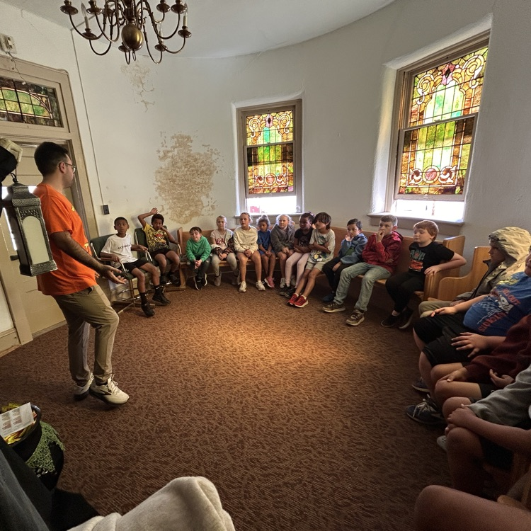 Mr. Holmes introducing students to the Haunted Kastle 
