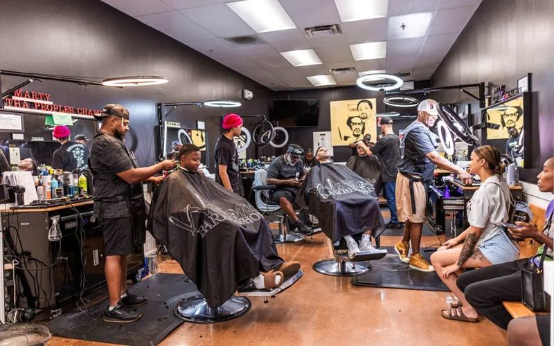 Watson's Barber Shop employs 6 barbers to manage all its new and repeat customers. Photo by Molly Adams/Lawrence Times.