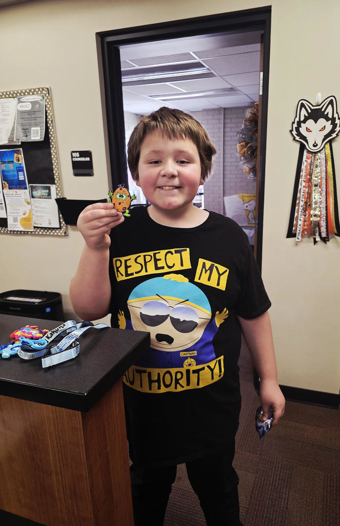 Odin holding one of his prizes