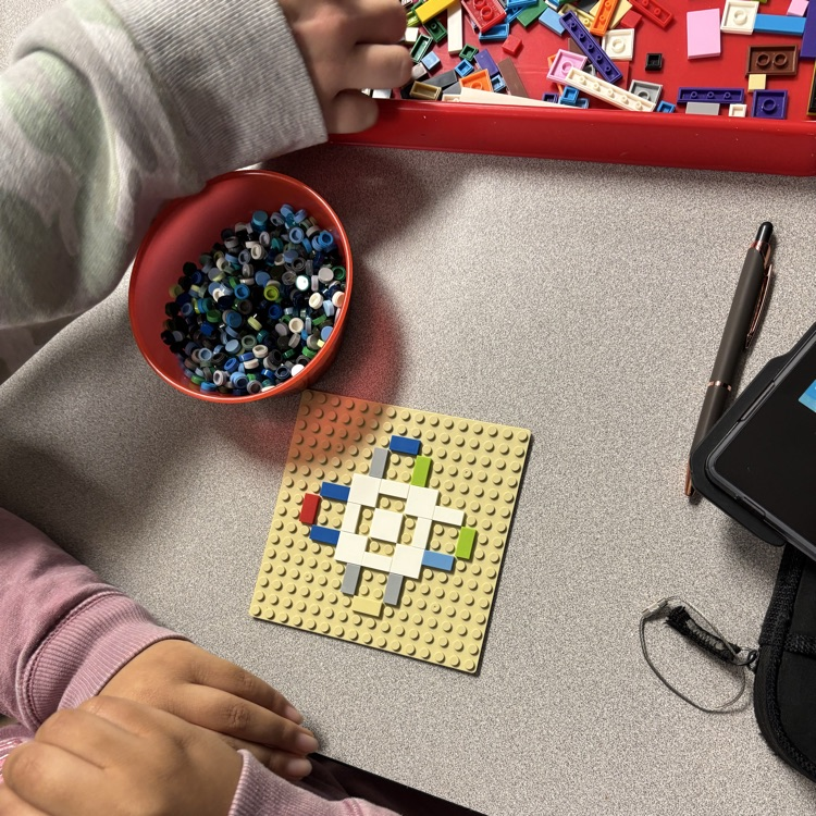 Lego base plate with design.