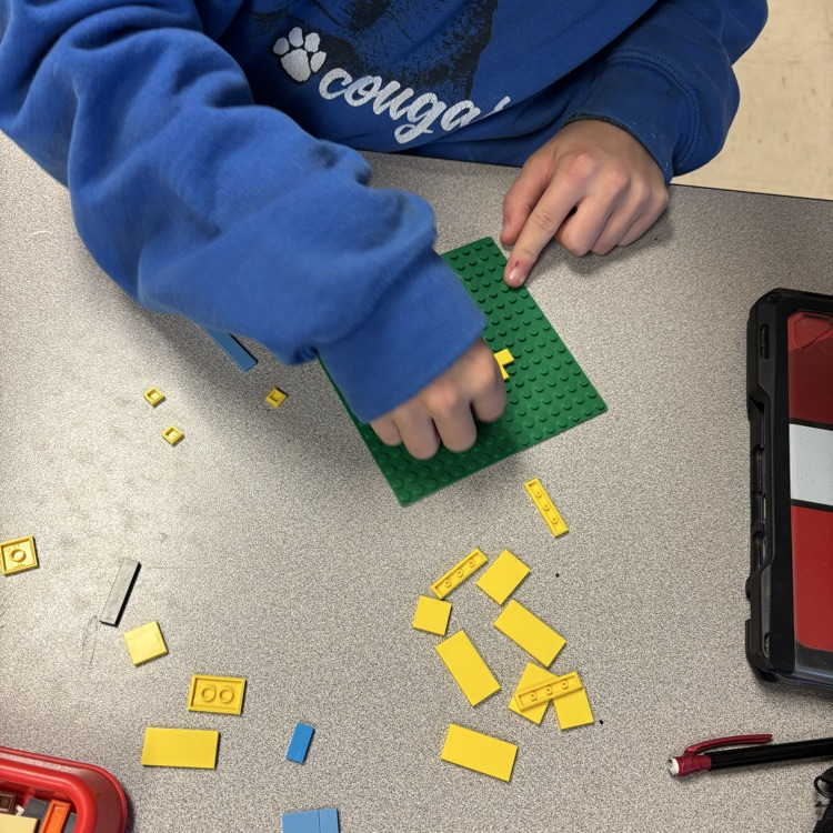 Lego base plate with design.