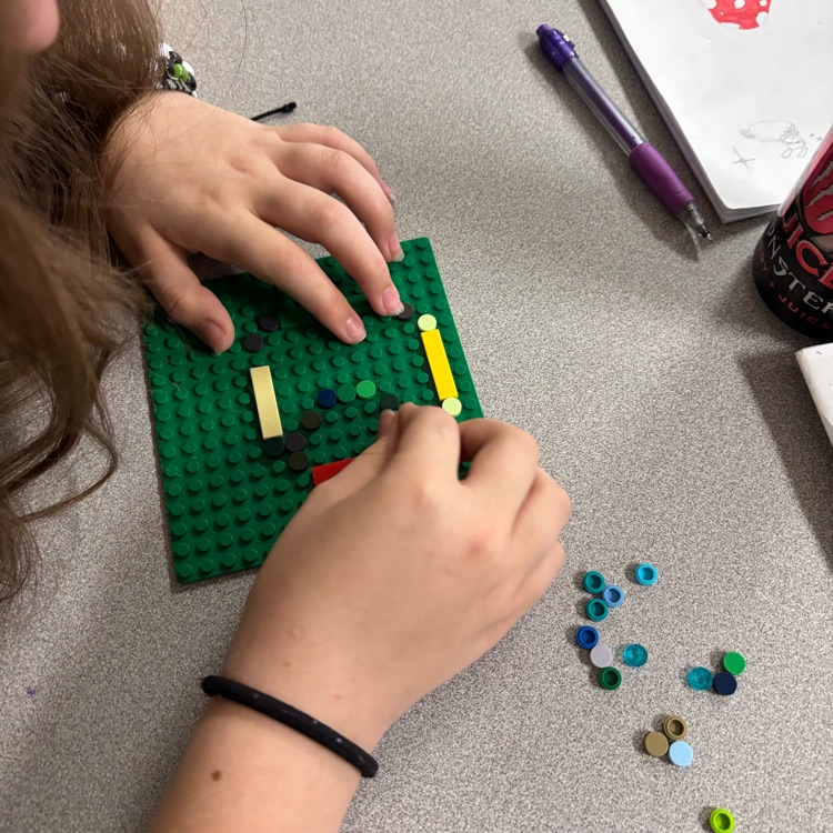 Lego base plate with design.