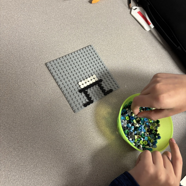 Lego base plate with design.