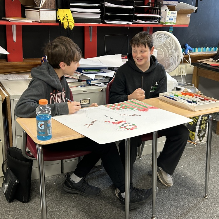 students working in desks 