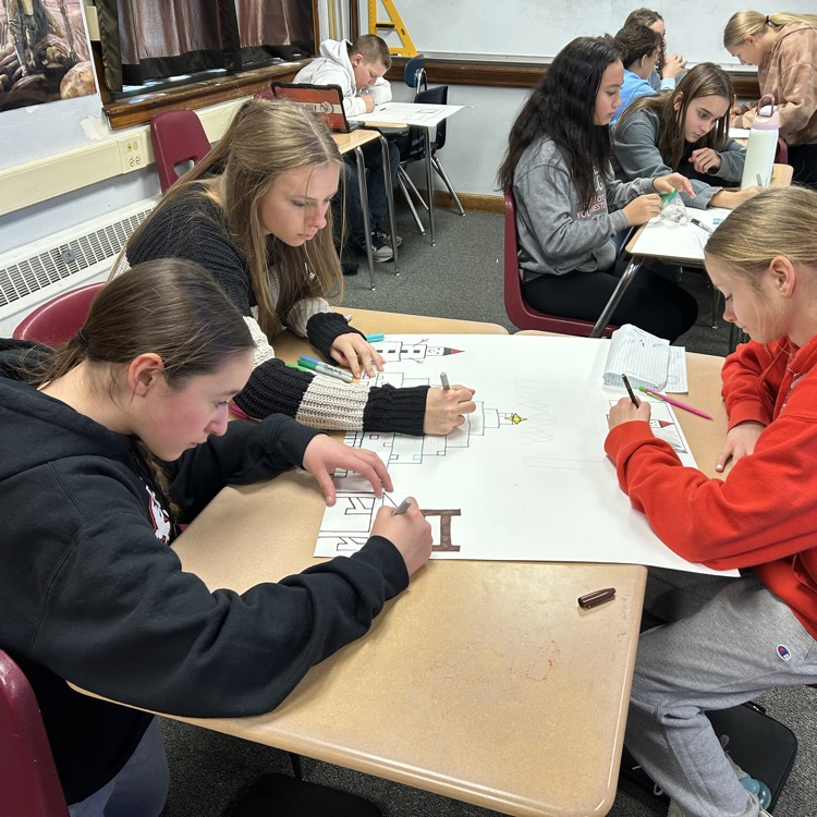 students working in desks 