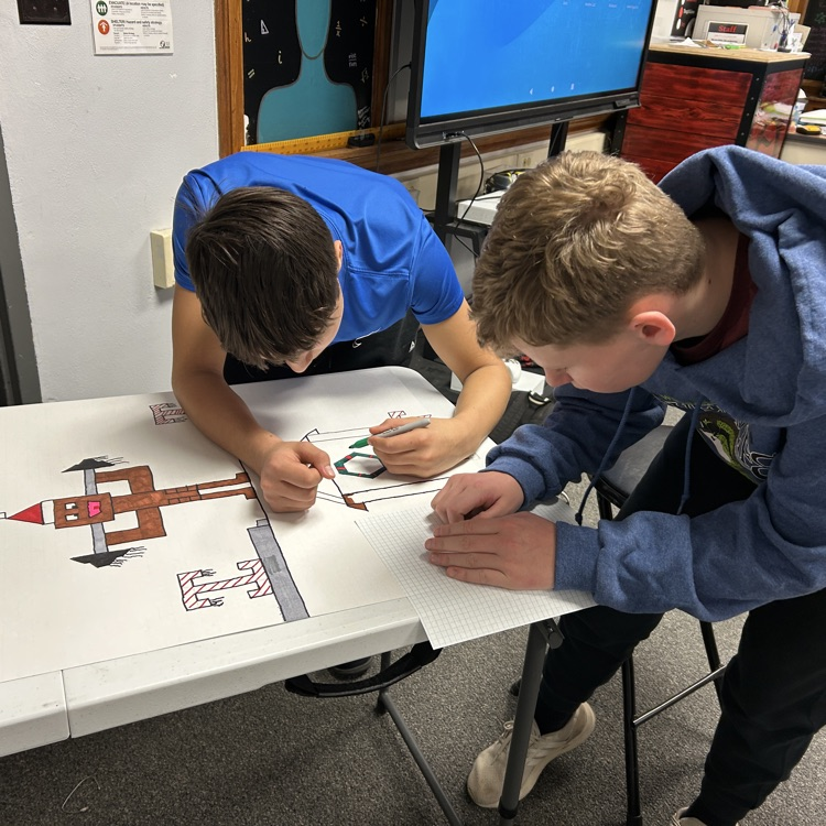 students working in desks 