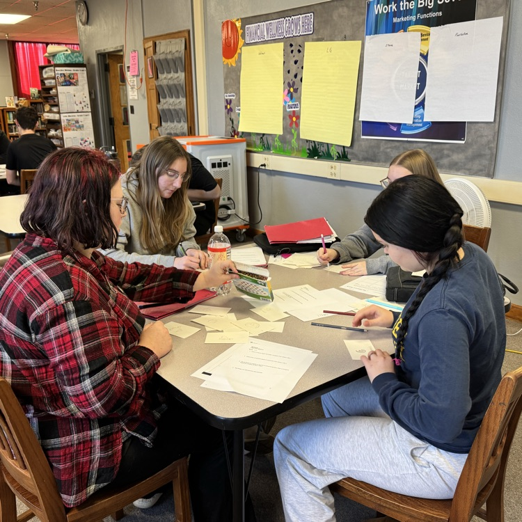 students at a table 