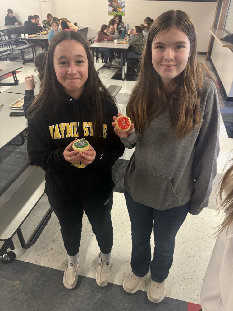 students decorating cookies 