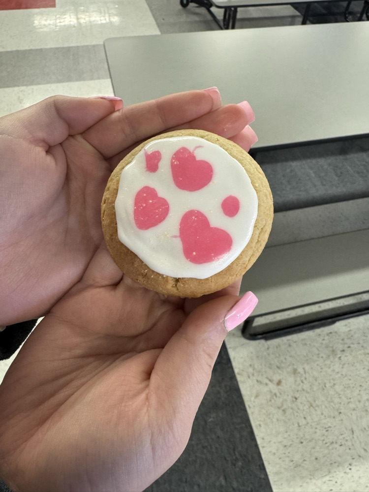 students decorating cookies 