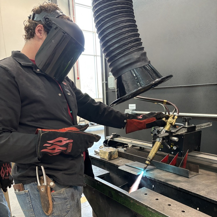 students using OA track cutter