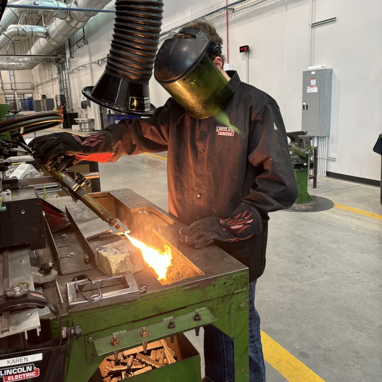 students using OA track cutter