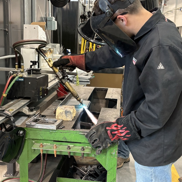 students using OA track cutter