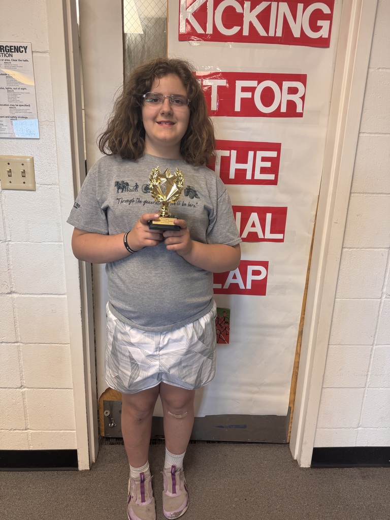 student with trophy