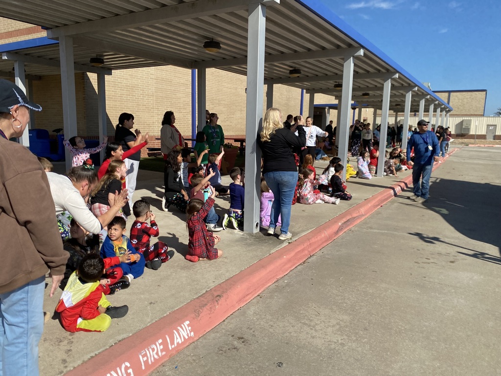 Mr and Mrs. Claus and their Elf stopped by