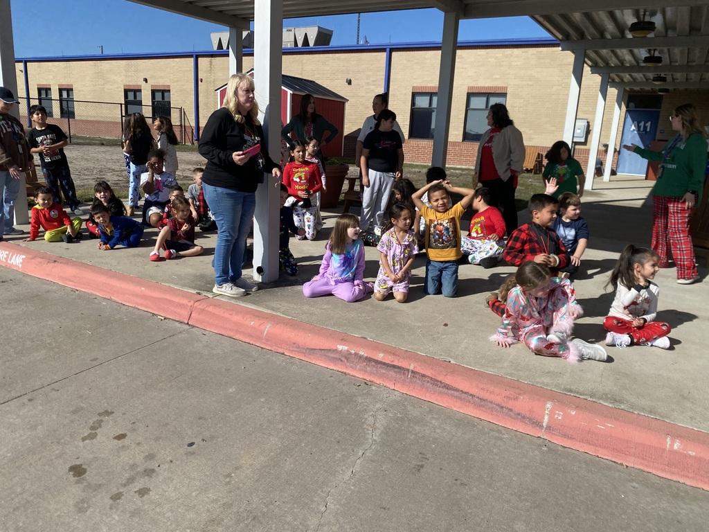 Mr and Mrs. Claus and their Elf stopped by