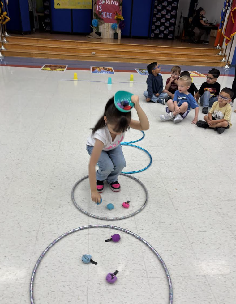 During group with Ms. Kristin, Pre-K students engaged in exercises that stimulated the vagus nerve, encouraged crossing the body’s midline, activated the core, and required focused attention to support emotional regulation.