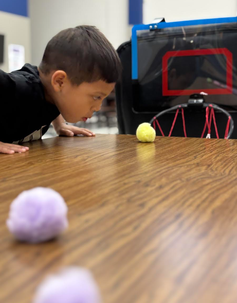 During group with Ms. Kristin, Pre-K students engaged in exercises that stimulated the vagus nerve, encouraged crossing the body’s midline, activated the core, and required focused attention to support emotional regulation.