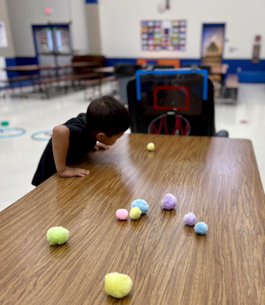 During group with Ms. Kristin, Pre-K students engaged in exercises that stimulated the vagus nerve, encouraged crossing the body’s midline, activated the core, and required focused attention to support emotional regulation.