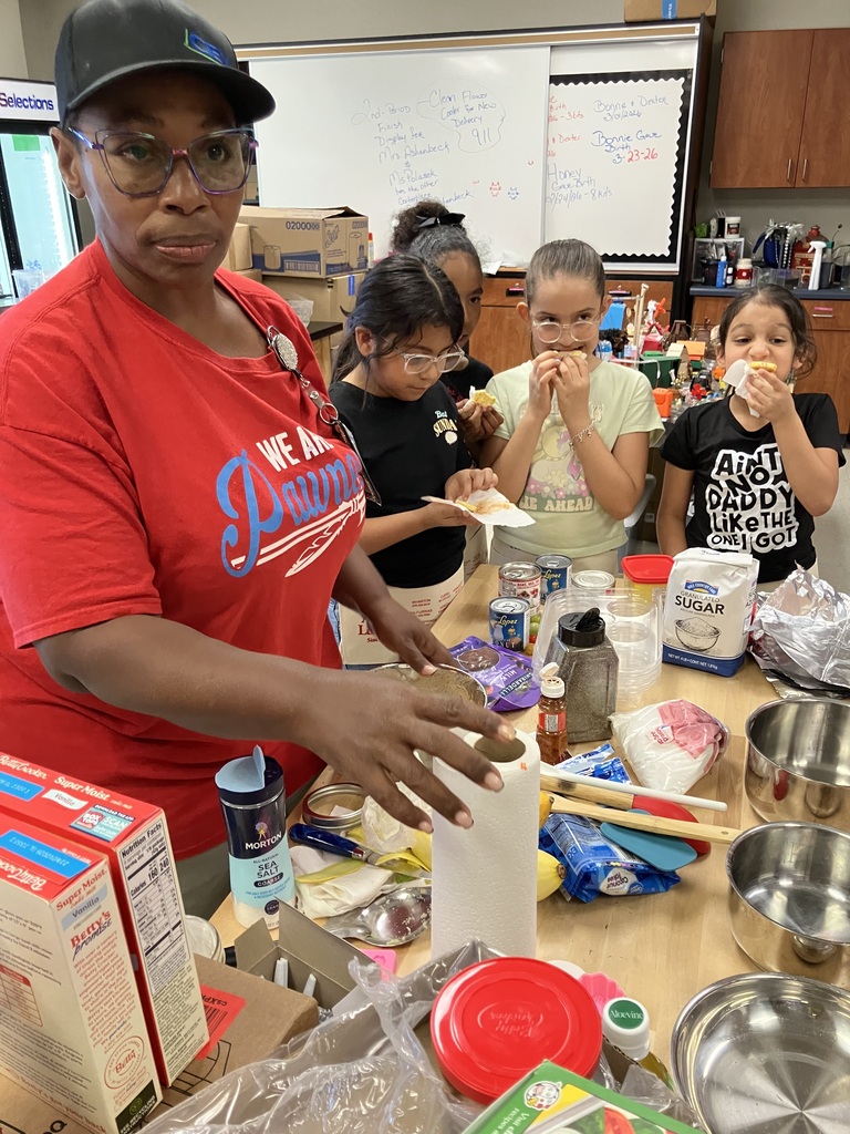 Second graders enjoying a taste test of fresh basil, squash, and spaghetti squash that they planted and harvested. Thank you Ms. Latin for teaching us how to grow nutritious food and a special thank you for the work aprons.