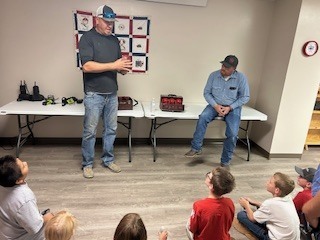 Learning about the old fashioned fire extinguishers they discovered in the attic.