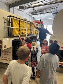 Learning about the water carrier.
