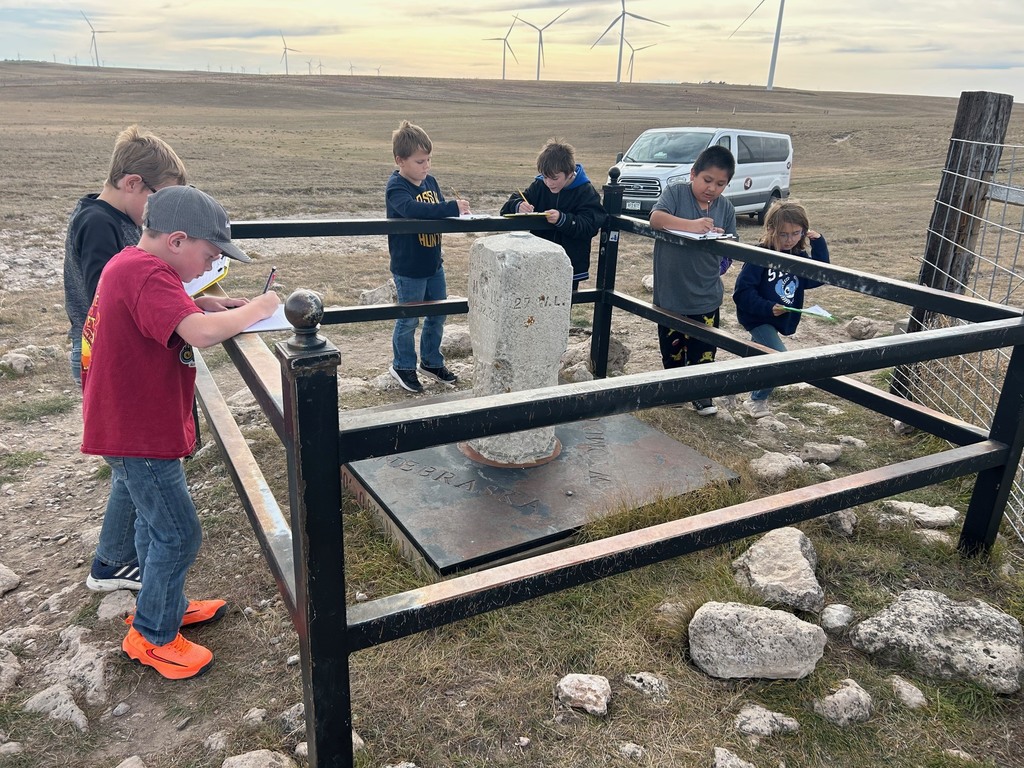 Studious students learning about Three Corner.