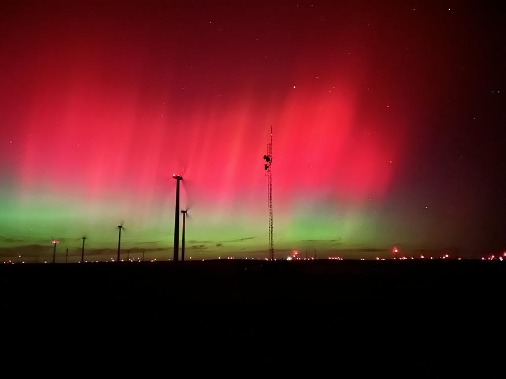 On Veteran's Day we had a solar storm, so I drove out to the turbines to get a picture of the Aurora Borealis with the turbines in the foreground.