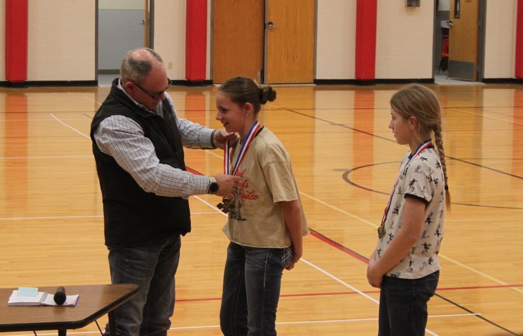 Emma receiving her Badge of Courage