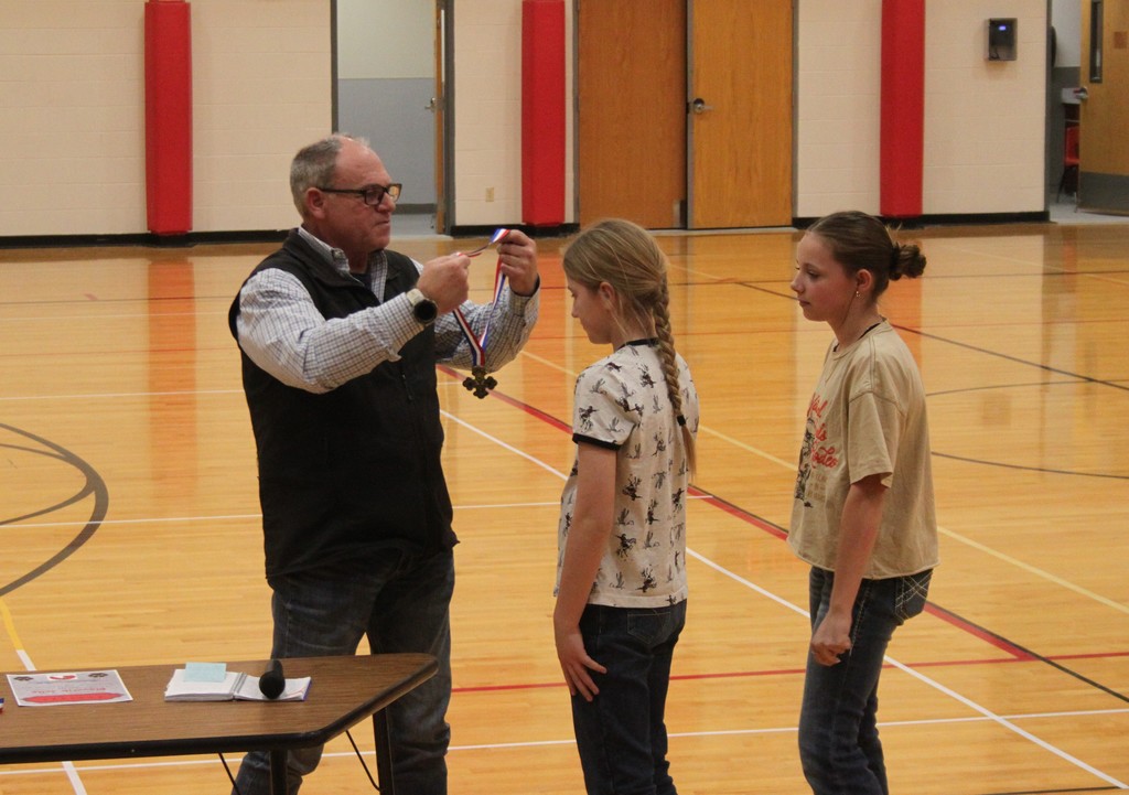 Maverick receiving her Badge of Courage