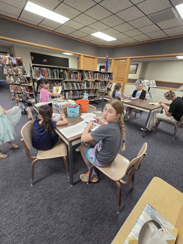 Maverick reading to Noah.