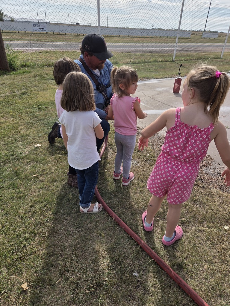 Students spraying water.