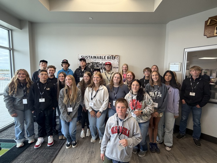 Paxton students by Sustainable Beef sign.