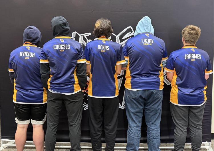 Team names on the back of their shirts.