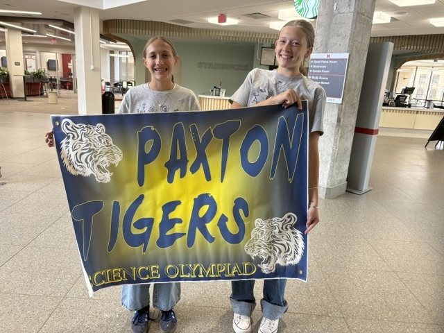 Hadley and Brynn with Paxton Tigers sign.