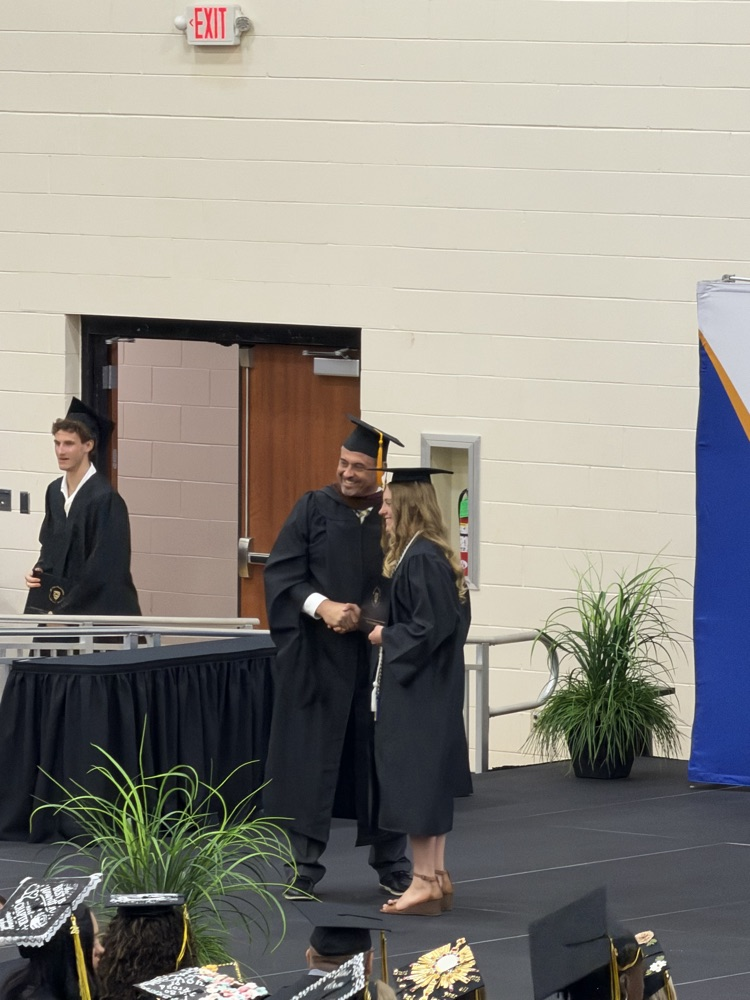 Ella Fote receiving her associates degree.