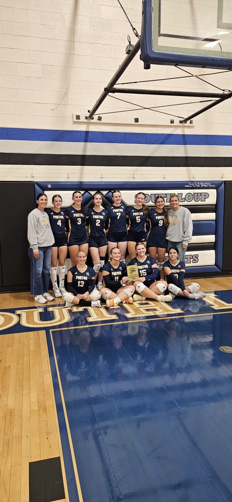 picture of the girls holding up the runner up plaque for the seven valleys tournament.