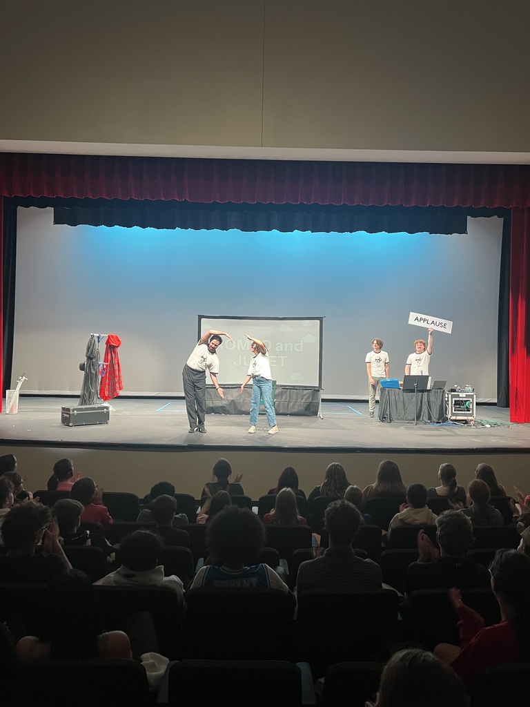 students in theatre presenting a play