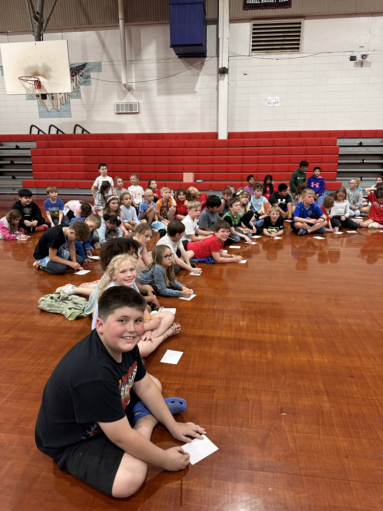 students on gym floor