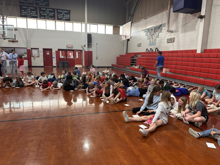 students on gym floor