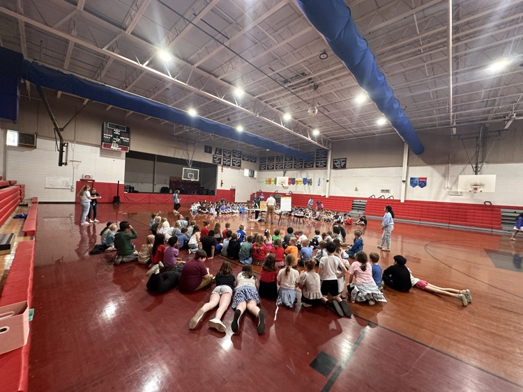 students on gym floor 