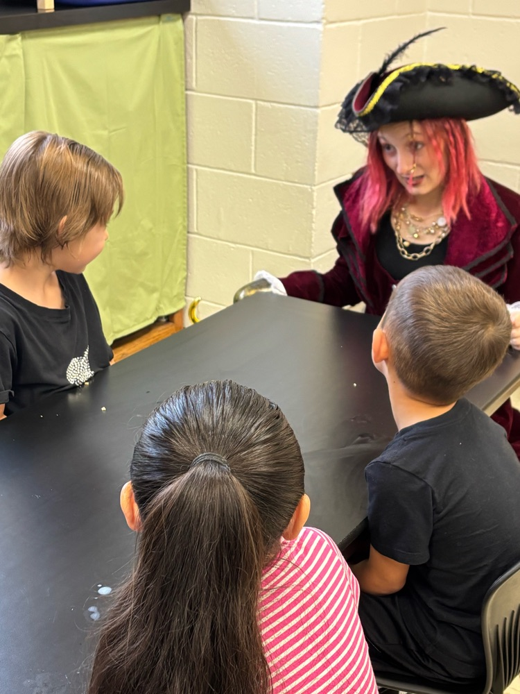 cast of Peter and Wendy reading to children