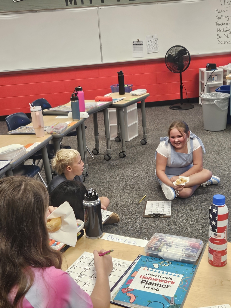 students enjoying doughnuts 