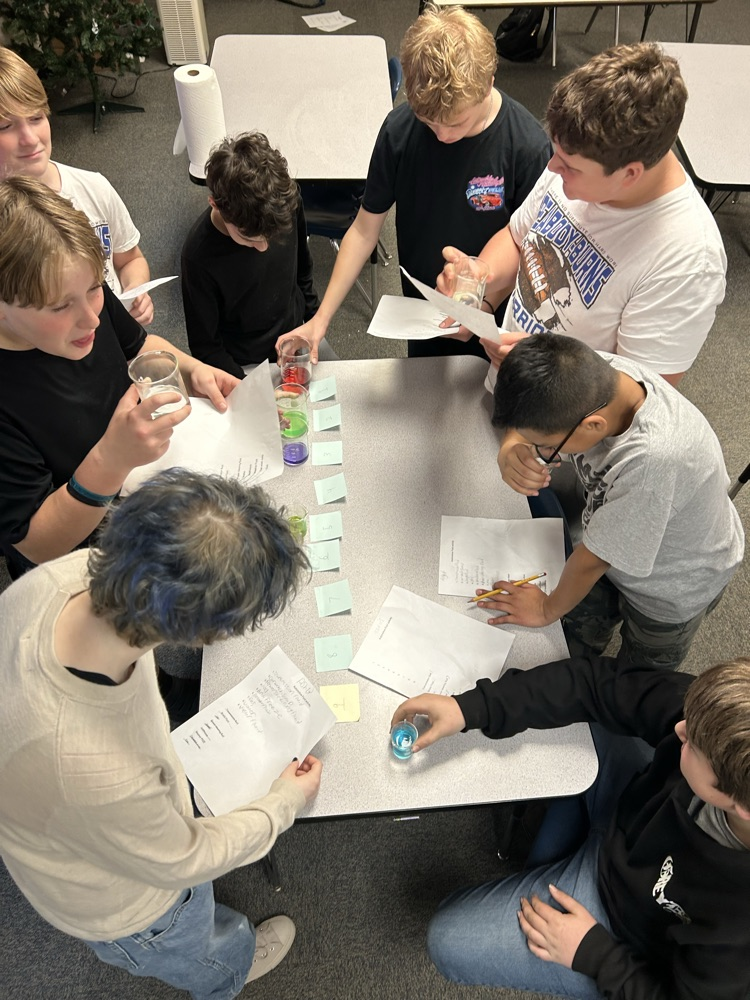 Students in Mr. McGee’s automotive learning lab guessing the auto fluids by sight.