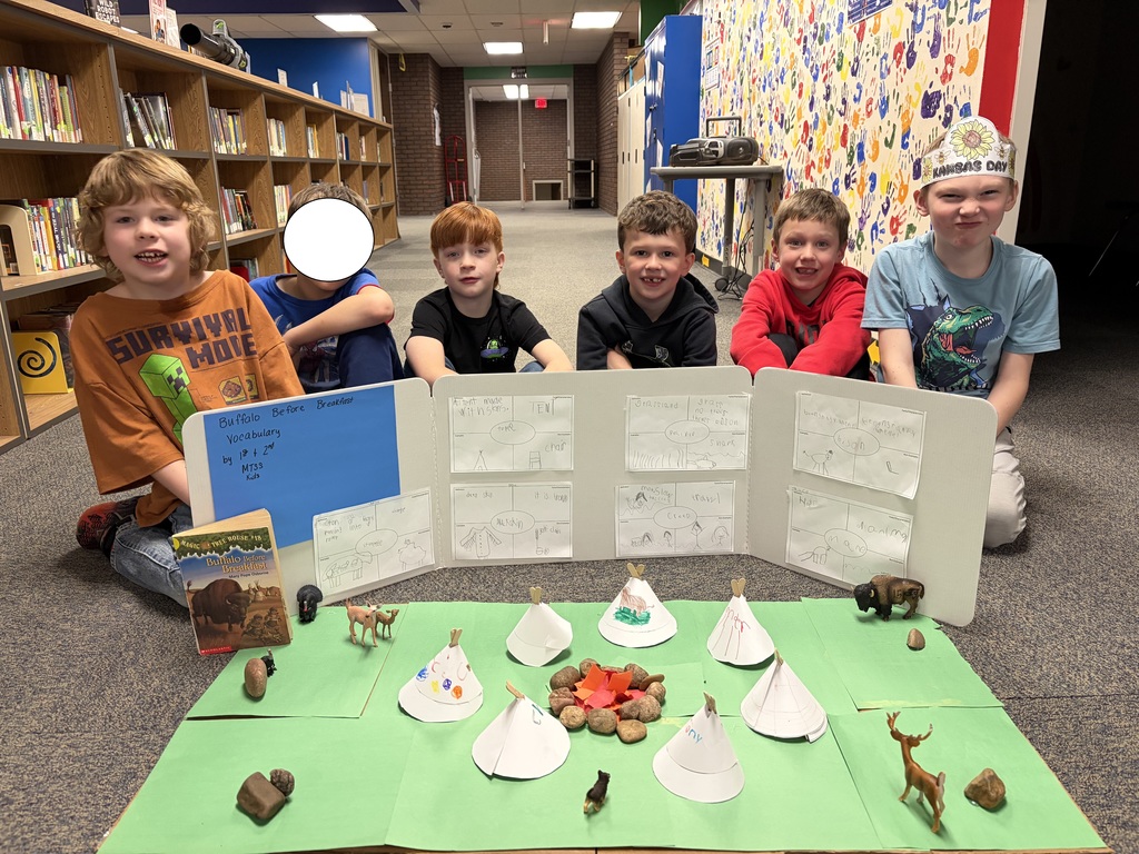 Students with their 1800's prairie display