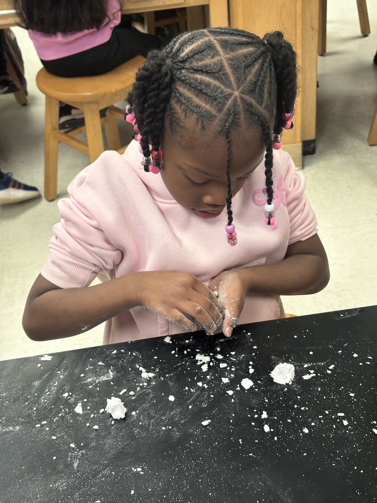 Students making snow in art class