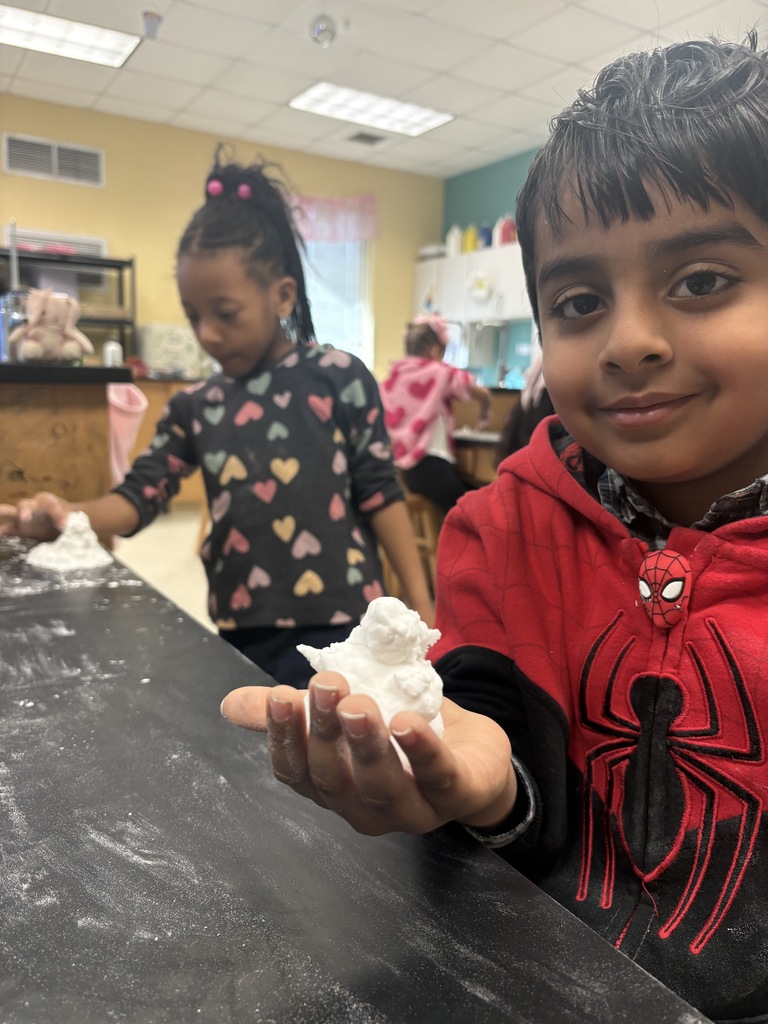Students making snow in art class