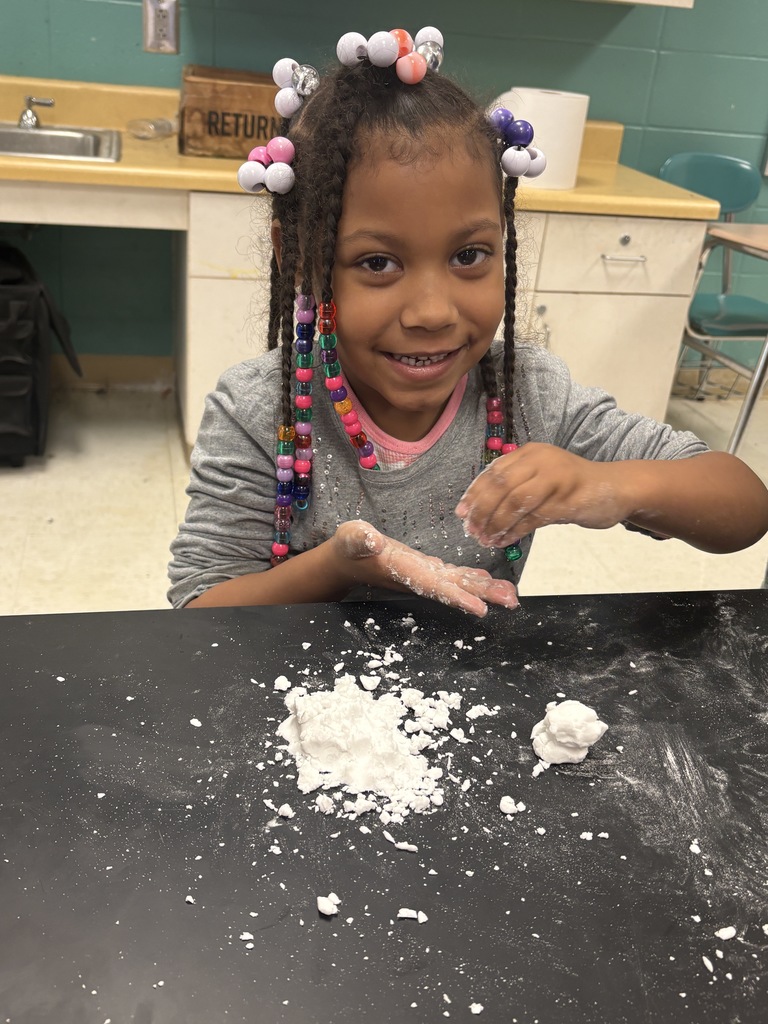Students making snow in art class