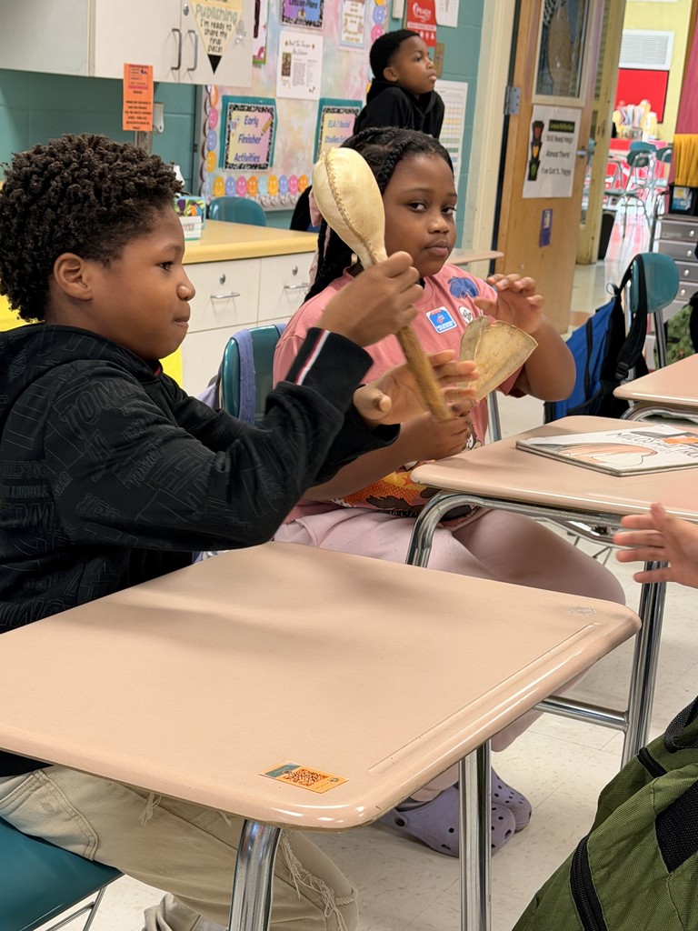 Students exploring Native American Artifacts