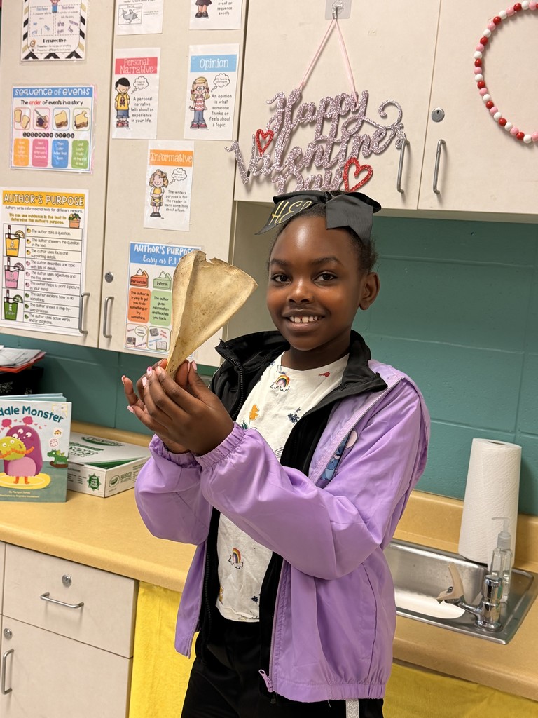 Students exploring Native American Artifacts